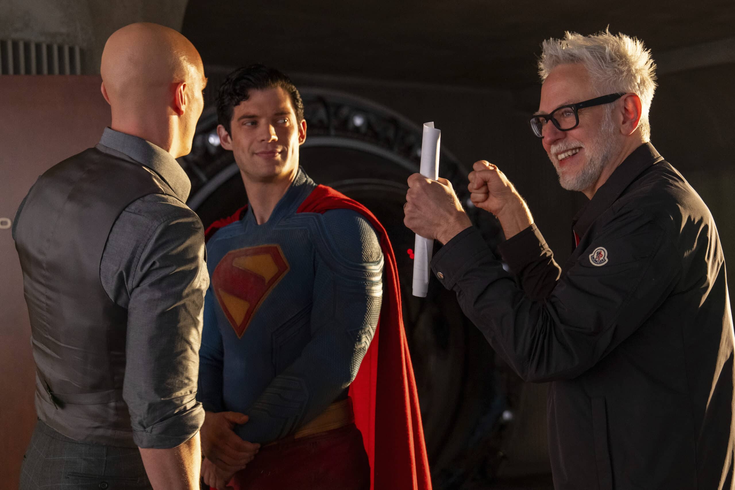 This image released by Warner Bros. Pictures shows Nicholas Hoult, (left), David Corenwet, (center) and director James Gunn on the "Superman" set. Image: Jessica Miglio/Warner Bros. Photo