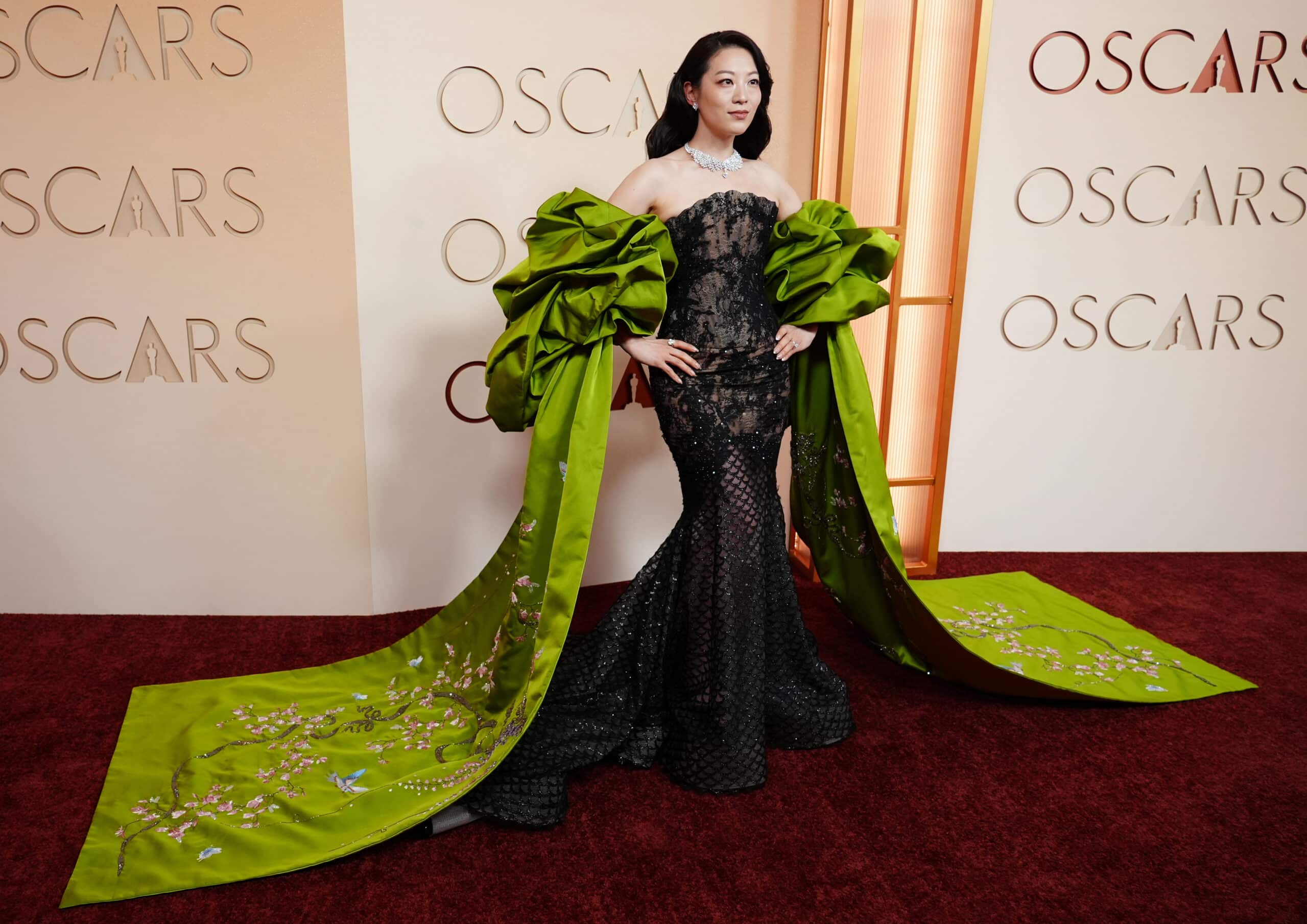 Oscars red carpet sees pops of color as stars arrive